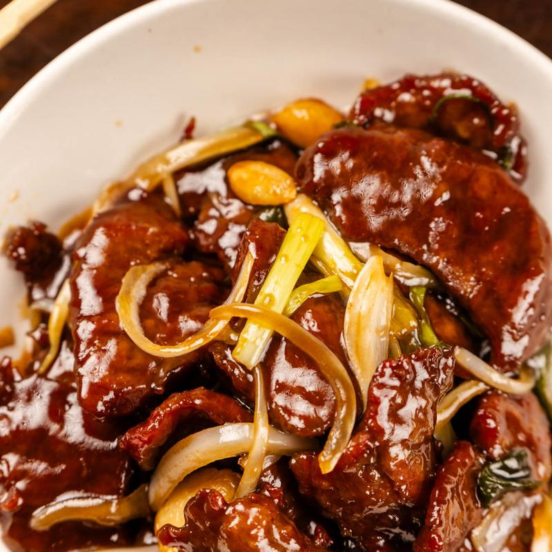 Tropical Chinese Restaurant signature dishes Peking Duck, Dim Sum, Orange Peel Beef, Yeung Chow Fried Rice